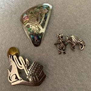 Three vintage Mexican sterling silver pins. Excellent condition